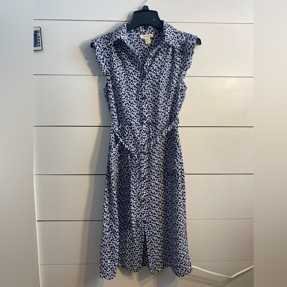 Women’s blue and white sleeveless dress